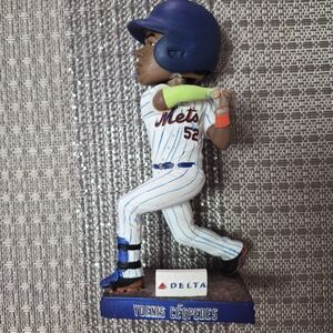 Delta Blue and White Baseball Figurine